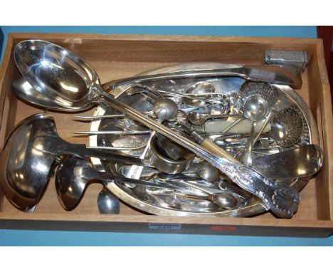 A small collection of miscellaneous silver plated wares to include; flatware, sifting spoons, caddy spoons etc 