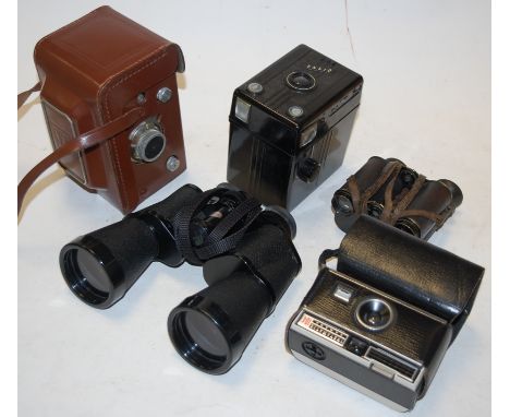 A Montiflex camera, in fitted leather case; together with various other cased cameras, a pair of binoculars etc    Condition 