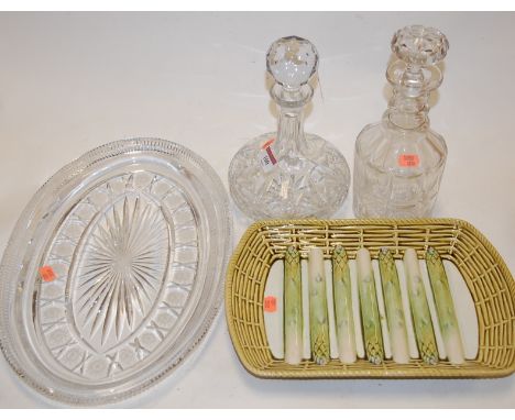 A 19th century glass decanter having a triple ring neck and mushroom stopper together with one other glass decanter and stopp