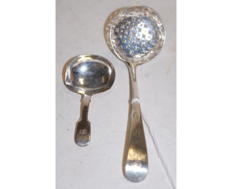 A 19th century silver caddy spoon; together with one other 19th century pierced silver sifting spoon (2)