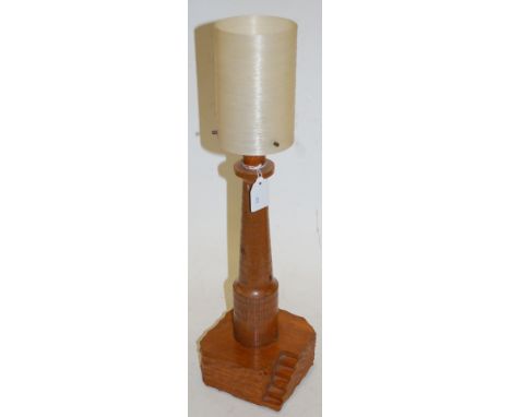 A 1960s carved oak table lamp base, in the form of a lighthouse, h.53cm including shade