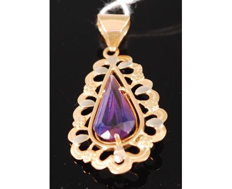 A modern 18ct two-colour gold and amethyst set pendant, 3.6cm (excluding bale)