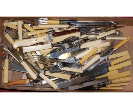 A box of miscellaneous loose silver plated flatware