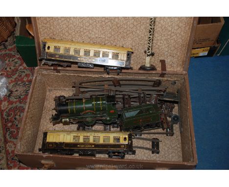 A Hornby clockwork Engine - ''County of Bedford'' No. 3821, plus assorted rolling stock and rails, Pullman carriages, in case
