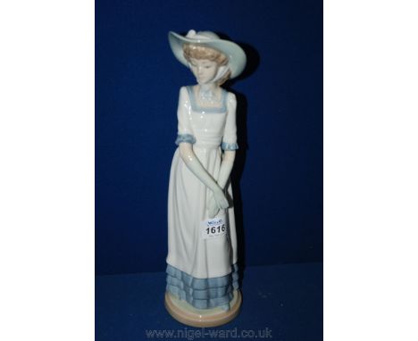 A Nao figure of a young lady, 13'' tall