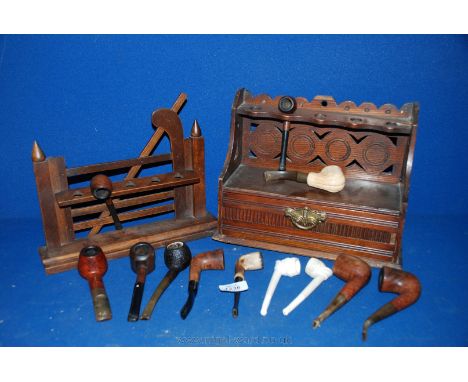 Twelve Estate Tobacco Pipes including Briar, Clay, etc., a pipe stand shaped as a garden gate and an Edwardian carved wood Pi