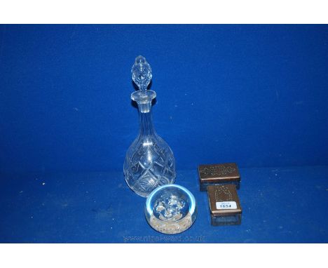 A Decanter with stopper, two glass trinket Boxes with plated lids and a Paperweight