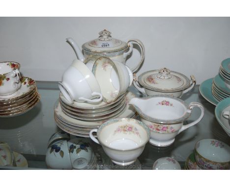 A Noritake four place setting Teaset including teapot, milk jug and sugar bowl.