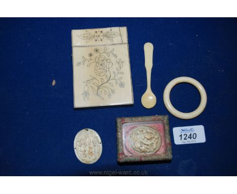 A pique inlaid Ivory visiting Card holder, two small Chinese pendants/carvings, teething ring and baby spoon