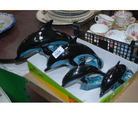 Four Poole Pottery Dolphins