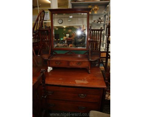 A Victorian Chestnut Dressing Chest having rectangular bevel plate mirror in frame with moulded top, in interesting shaped su