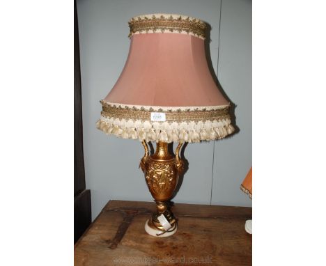 A Table Lamp with pink Beazley shade. 