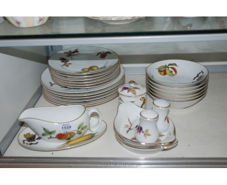 A Royal Worcester 'Evesham' part Dinner service comprising six dinner plates, six salad plates, six soup bowls, condiment, sa