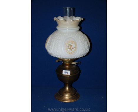 A Brass Oil Lamp with glass chimney and white glass shade