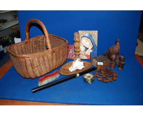 A shopping Basket containing various wooden items, Australian teapot stand depicting Australian animals and reptiles, small b