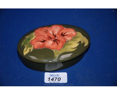 A Moorcroft Hibiscus design oval Trinket Box