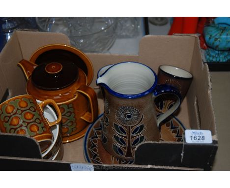 Four pieces of German salt glazed stoneware including Jug, Plate and two Beakers.  All hand decorated in dark blue and green 