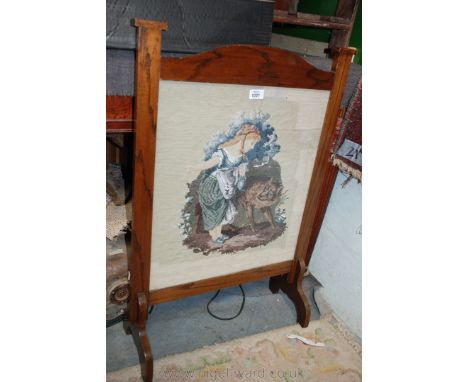 A Victorian beadwork, in later Oak firescreen frame