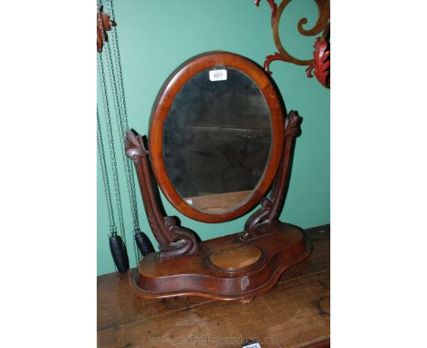 A Victorian Mahogany Dressing Mirror with oval mirror and trinket box