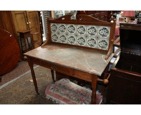 A good quality Victorian Satinwood Washstand, carved pediment top, twelve blue and white floral pattern tile back in Satinwoo