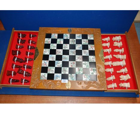 An oriental Chess Set - complete with pieces