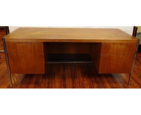 Circa 1968 Large desk by Florence Knoll in Rio Rosewood and Chromed Metal. Unsigned. "As Found" Condition, with Scratches, Ru