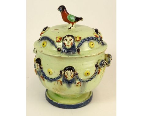 Unusual 19/20th Century Glazed Pottery Covered jar with Bird Finial and Mask Decoration. Unsigned. Chips and Firing Cracks ot