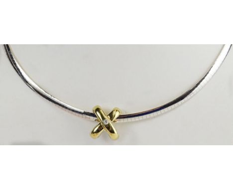 Lady's 14 Karat Yellow and White Gold Necklace with Reversible Omega Chain and Sliding X with Small Accent Diamond. Signed 14