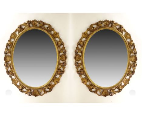 Pair of Early 20th Century Carved and Giltwood Mirrors. Unsigned. Minor Rubbing Otherwise Good Condition. Measure 30-1/2 Inch