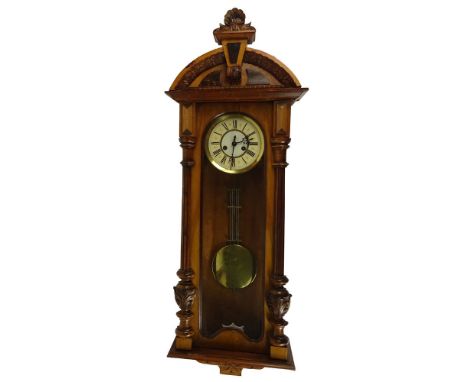 Antique Carved Wood Regulator Wall Clock. Painted Metallic and Brass Face. Unsigned. The Clock Appears to have all pieces int