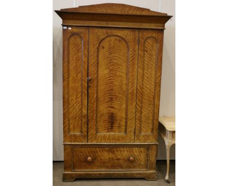 A Victorian Scumbled Pine Single Door Wardrobe, circa 1870, with an architectural pediment above an arched cupboard door encl