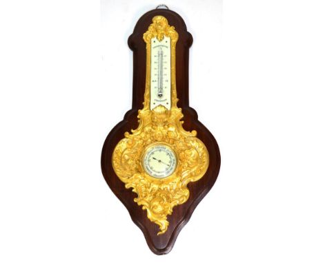 An Ormolu Aneroid Barometer, circa 1900, scroll and floral decorated case signed to the edge F.Barbedienne, thermometer tube,