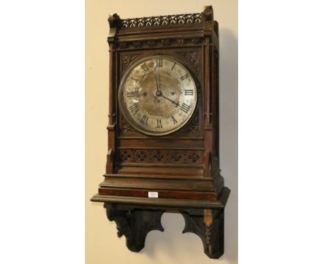 A Large Gothic Style Carved Oak Chiming Bracket Clock, circa 1870, pediment with a pierced gallery, carved and pierced side s
