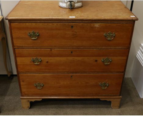 A 19th Century Pine Three Drawer Straight Front Chest of Drawers, with brass solid backplate handles and raised on splayed br