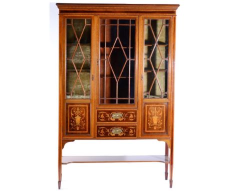 An Edwardian Mahogany and Satinwood Banded Sheraton Revival Display Cabinet, with astragal glazed doors enclosing a velvet li