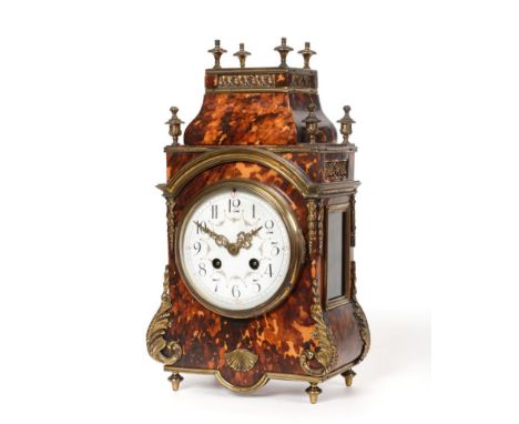 A Tortoiseshell and Gilt Metal Mounted Striking Mantel Clock, early 20th century, caddied pediment with urn shaped finials, s