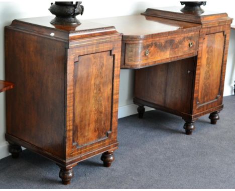 A Regency Mahogany and Brass Strung Pedestal Sideboard, early 19th century, of bowfront form with a long frieze drawer, each 