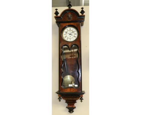 A Burr Walnut Veneered Vienna Type Wall Timepiece, circa 1890, arched pediment, glazed trunk door and sides, 6-1/2-inch ename