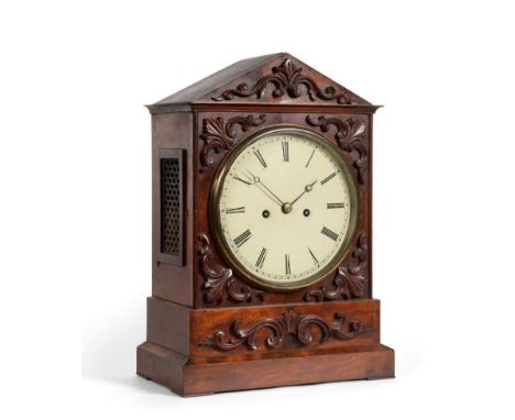 A Mahogany Striking Table Clock, circa 1830, architectural pediment, side sound frets, front with applied carved mounts, 8-in