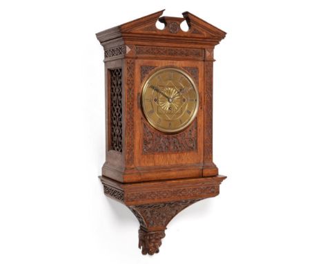 A Carved Oak Chiming Bracket Clock, circa 1880, broken arch pediment, blind fret borders, side sound frets, 9-inch dial with 