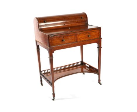 A Victorian Satinwood, Crossbanded and Ebony Strung Writing Table, late 19th century, with hinged domed lid enclosing a divid