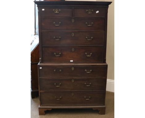 A George III Mahogany Chest on Chest, late 18th century, with Greek Key dentil cornice above two short and three long graduat