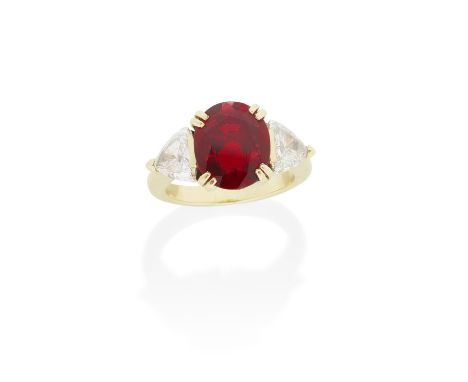 RUBY AND DIAMOND RINGThe oval-cut ruby, between triangular brilliant-cut diamond shoulders,  maker's mark, French assay mark,