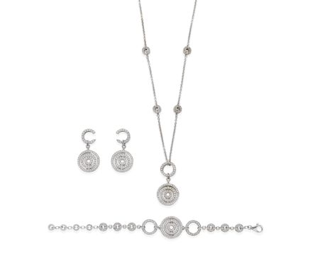 BULGARI: DIAMOND-SET 'ASTRALE' NECKLACE, BRACELET AND PENDENT EARRINGS SUITEThe pendant designed as a series of concentric ci