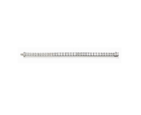 DIAMOND LINE BRACELETComposed of 38 step-cut diamonds, graduating in size towards the centre, claw settings,  numbered 12113,
