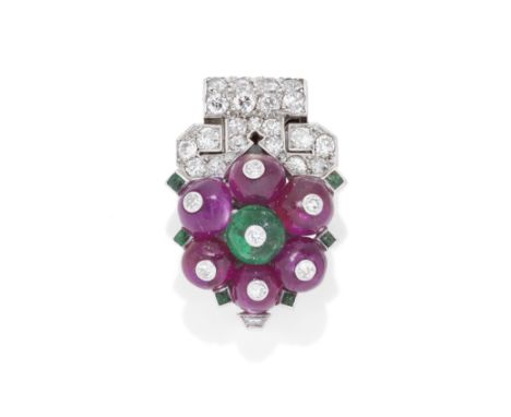 CARTIER: EMERALD, RUBY AND DIAMOND 'TUTTI FRUTTI' CLIP, CIRCA 1929The cluster of ruby beads surrounding an emerald bead inlai