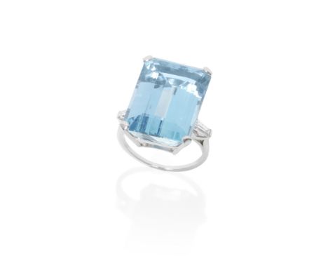 AQUAMARINE AND DIAMOND RING,The step-cut aquamarine, between tapered baguette-cut diamonds shoulders, aquamarine approximatel