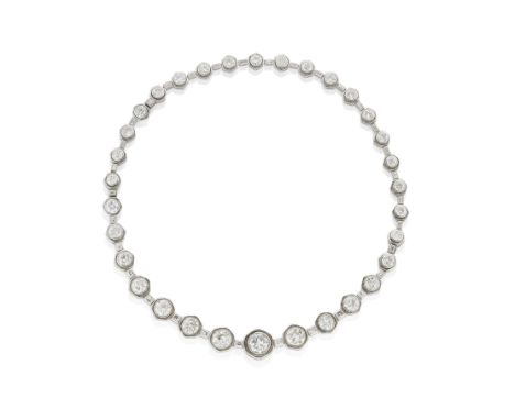 DIAMOND NECKLACE/BRACELET COMBINATIONThe articulated row of brilliant and old brilliant-cut diamonds, graduating in size towa