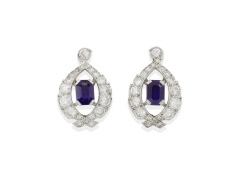 CARTIER: PAIR OF SAPPHIRE AND DIAMOND EARCLIPS, MID 20TH CENTURYEach of scrolling leaf design, centred with a step-cut sapphi