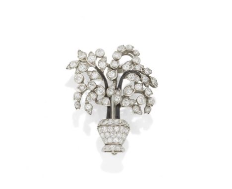 HENRI PICQ: ART DECO DIAMOND AND ENAMEL TREE BROOCH, CIRCA 1925The pierced vase pavé-set with single-cut diamonds, issuing a 